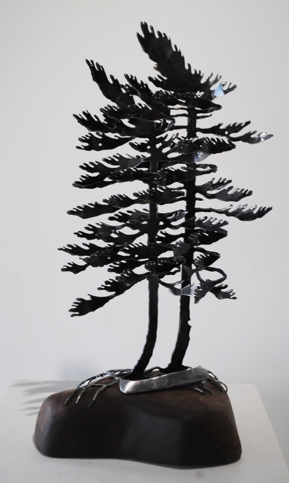 Windswept Pine (two) With Silver Canoe On Walnut by Cathy Mark